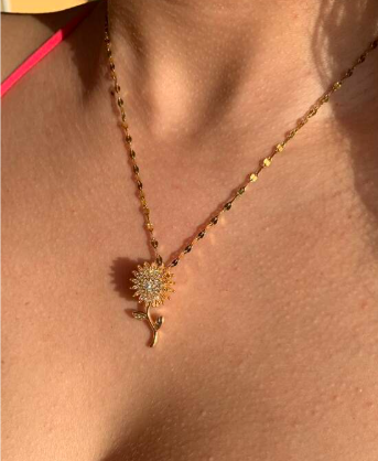 Collar con Diseño de Girasol Giratorio