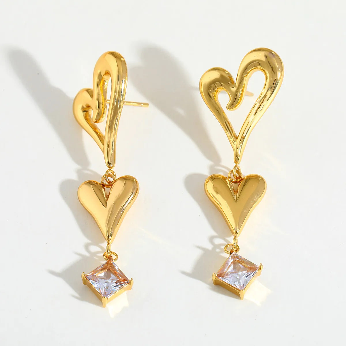 Aretes de Doble Corazón en Acero Inoxidable Chapado en Oro