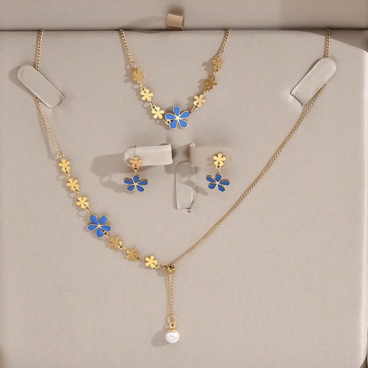 Conjunto Collar, Aretes y Pulsera Floral en Acero Inoxidable