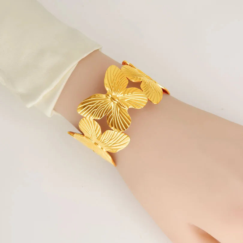 Brazalete Sólido de Mariposa en Acero Inoxidable Chapado en Oro