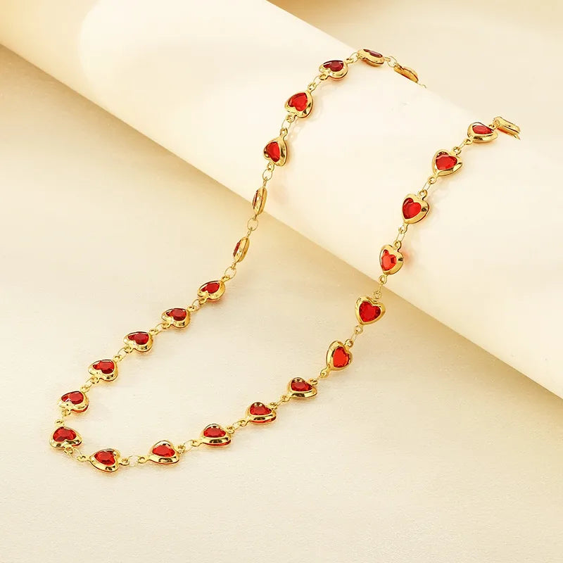 Conjunto de Collar y Pulsera de Corazones en Acero Inoxidable Chapado en Oro