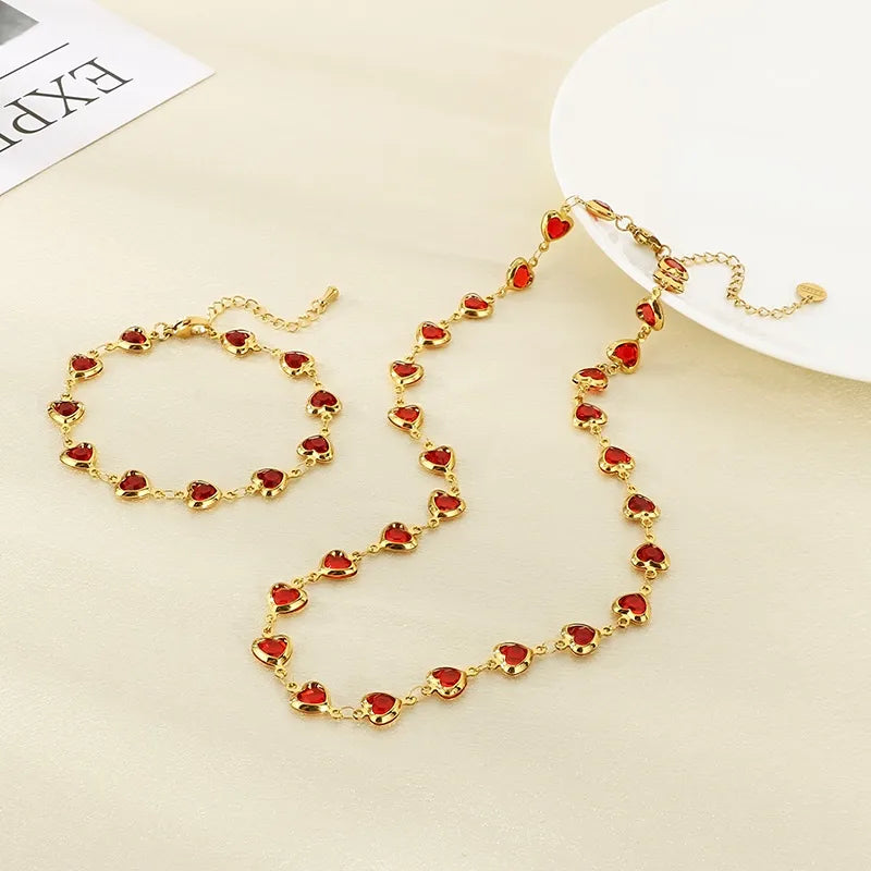 Conjunto de Collar y Pulsera de Corazones en Acero Inoxidable Chapado en Oro