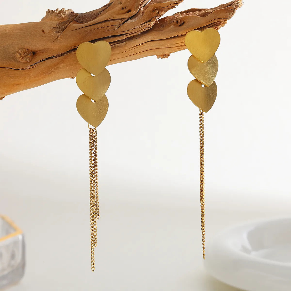 Aretes Largos de Corazones en Acero Inoxidable Chapado en Oro