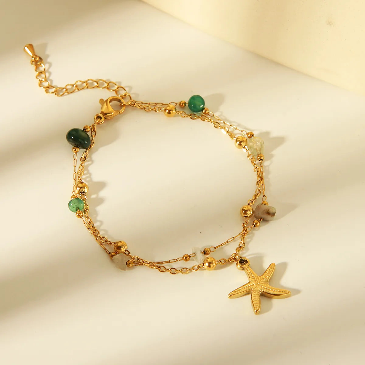 Pulsera Jade y Estrella de Mar en Acero Inoxidable Chapado en Oro