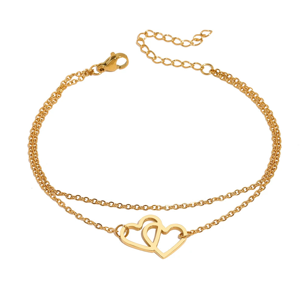 Pulsera Doble Corazón Entrelazado en Acero Inoxidable