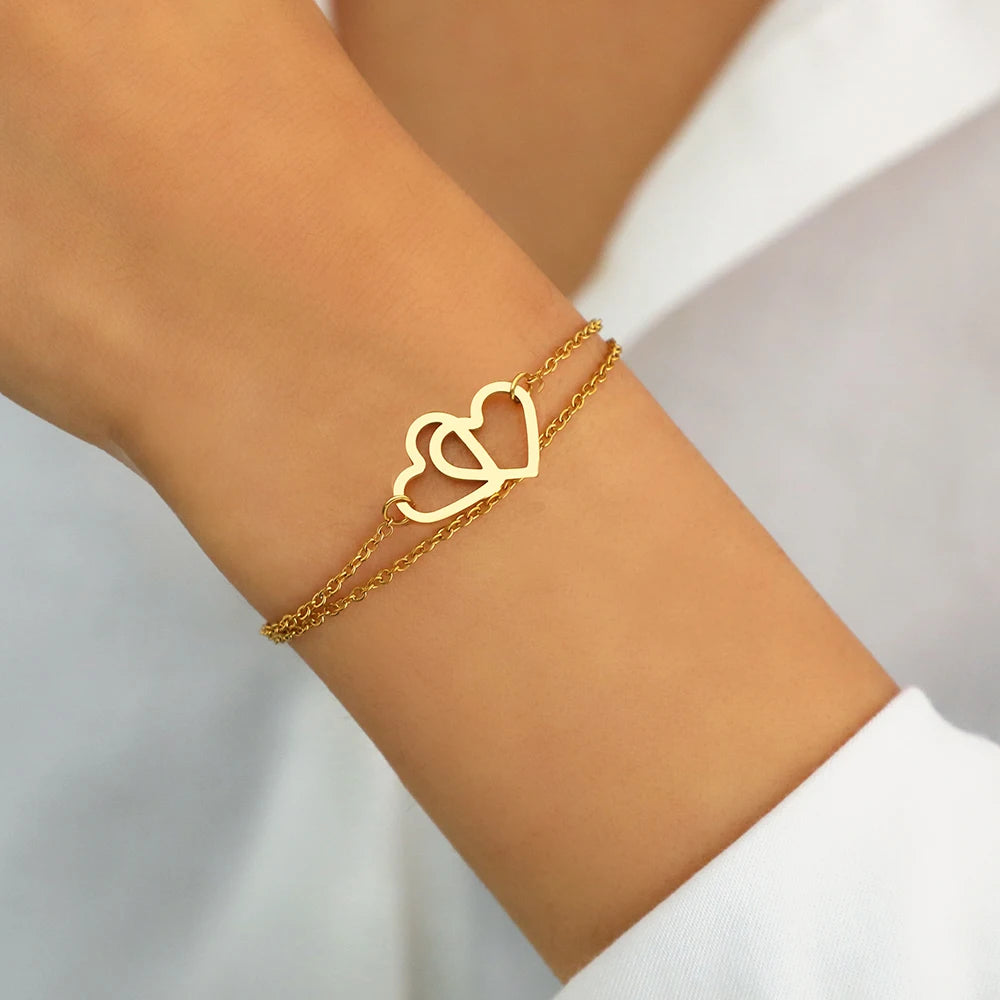 Pulsera Doble Corazón Entrelazado en Acero Inoxidable