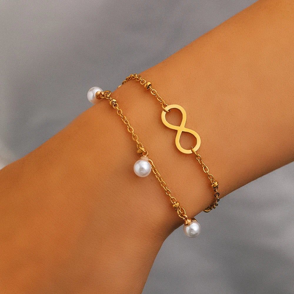 Pulsera Doble Cadena Infinito y Perlas en Acero Inoxidable 316L